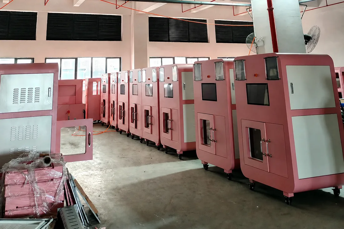 Finished commercial pet washing machines lined up in the PetWashPlus factory