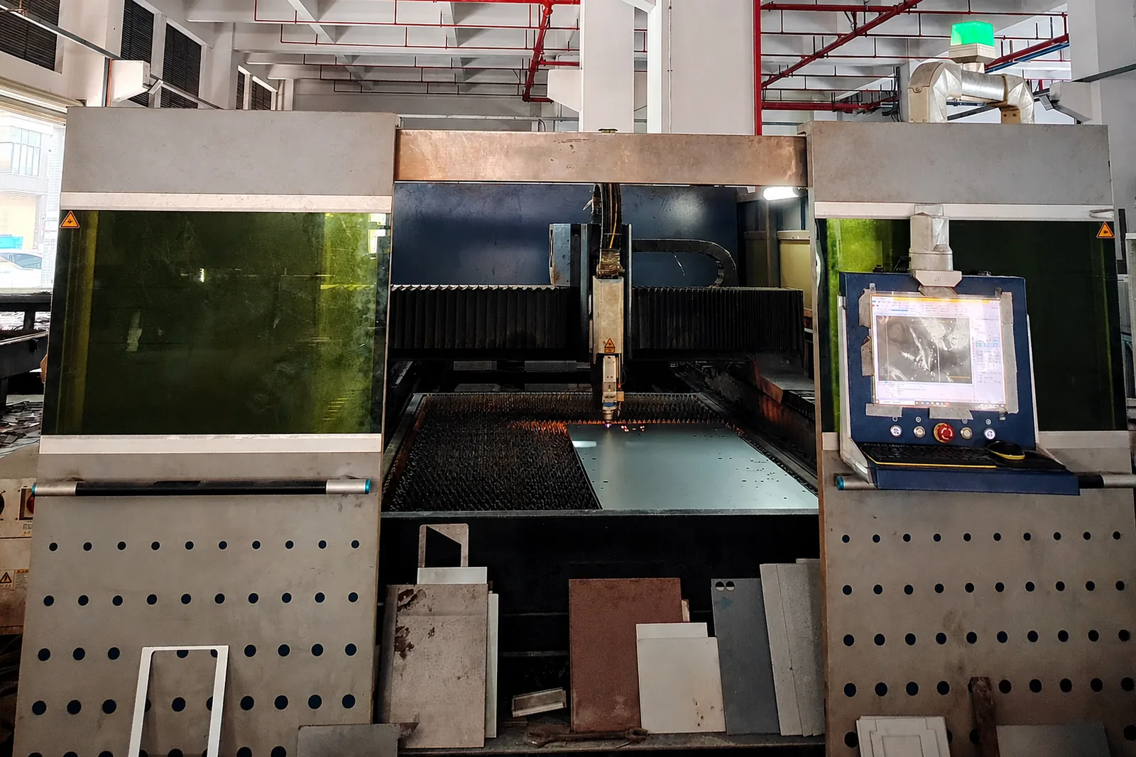 Fibre laser cutting steel for a pet washing machine cabinet panel