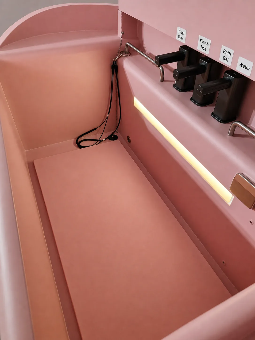 labelled dispenser taps on the pet wash tub for coat care, flea and tick, bath gel and water